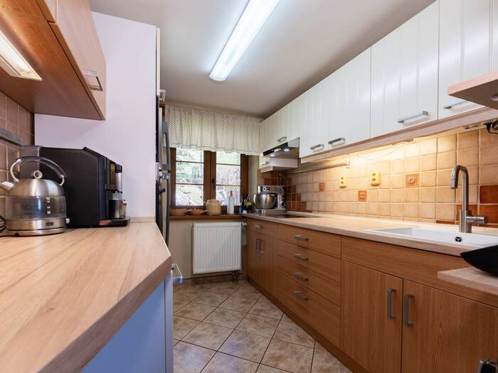 Prodej pozemku 180 m² — 32, Chomutov