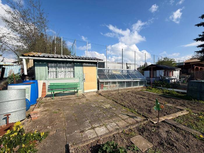 Prodej zahrady 200 m² — Dr. Janského, Chomutov
